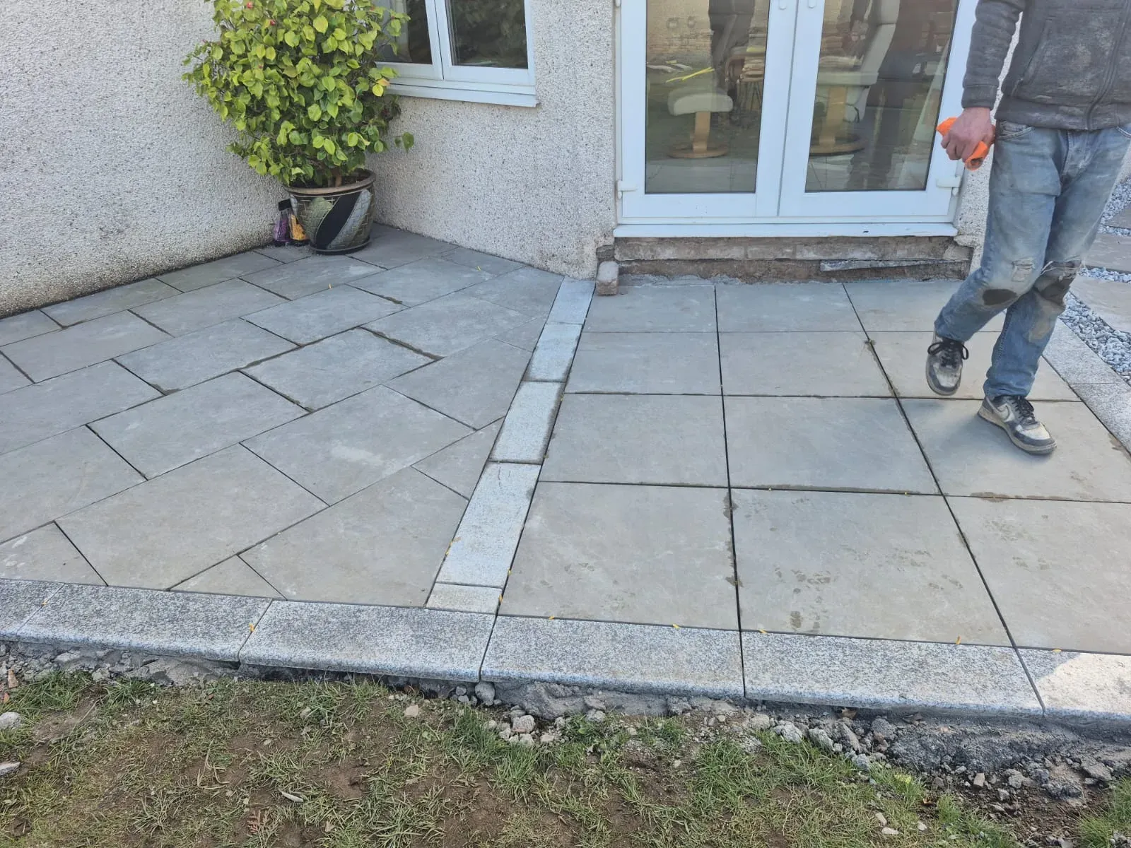 Sandstone patio with granite setts edging in Stirling